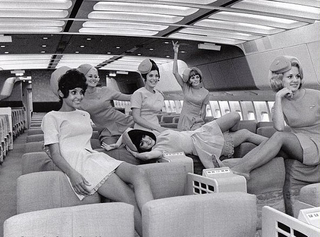 Illustration for article titled When Airplane Stewardesses Were All Glamour and Sex Appeal
